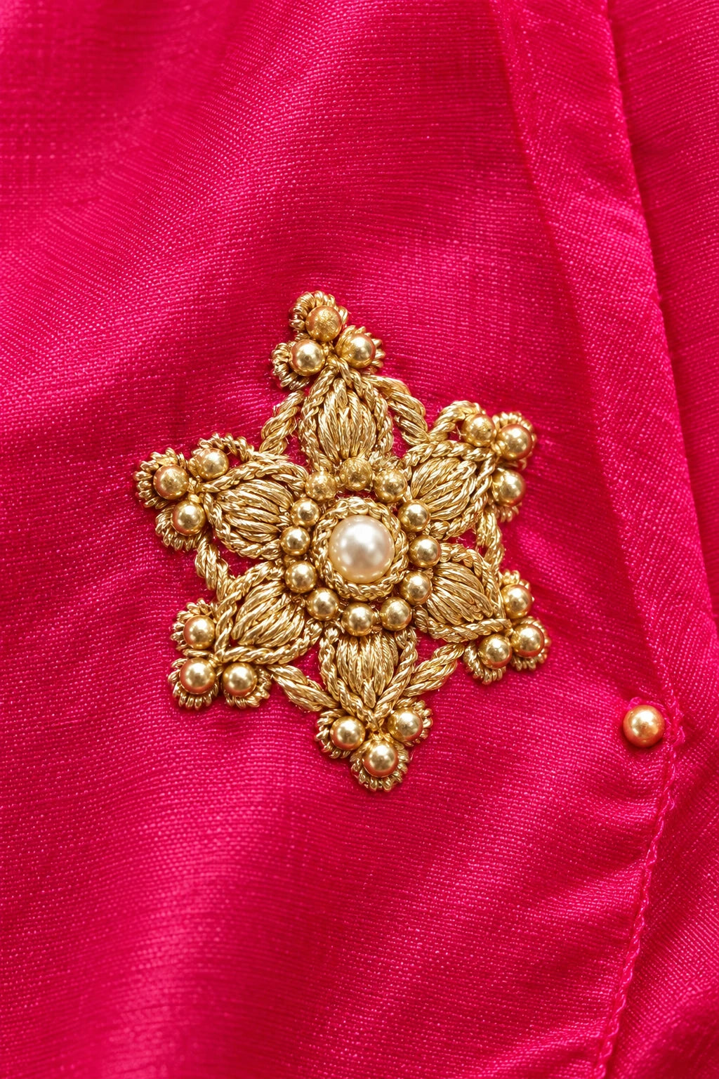 Fuchsia gold embroidery co-ord, work detail macro