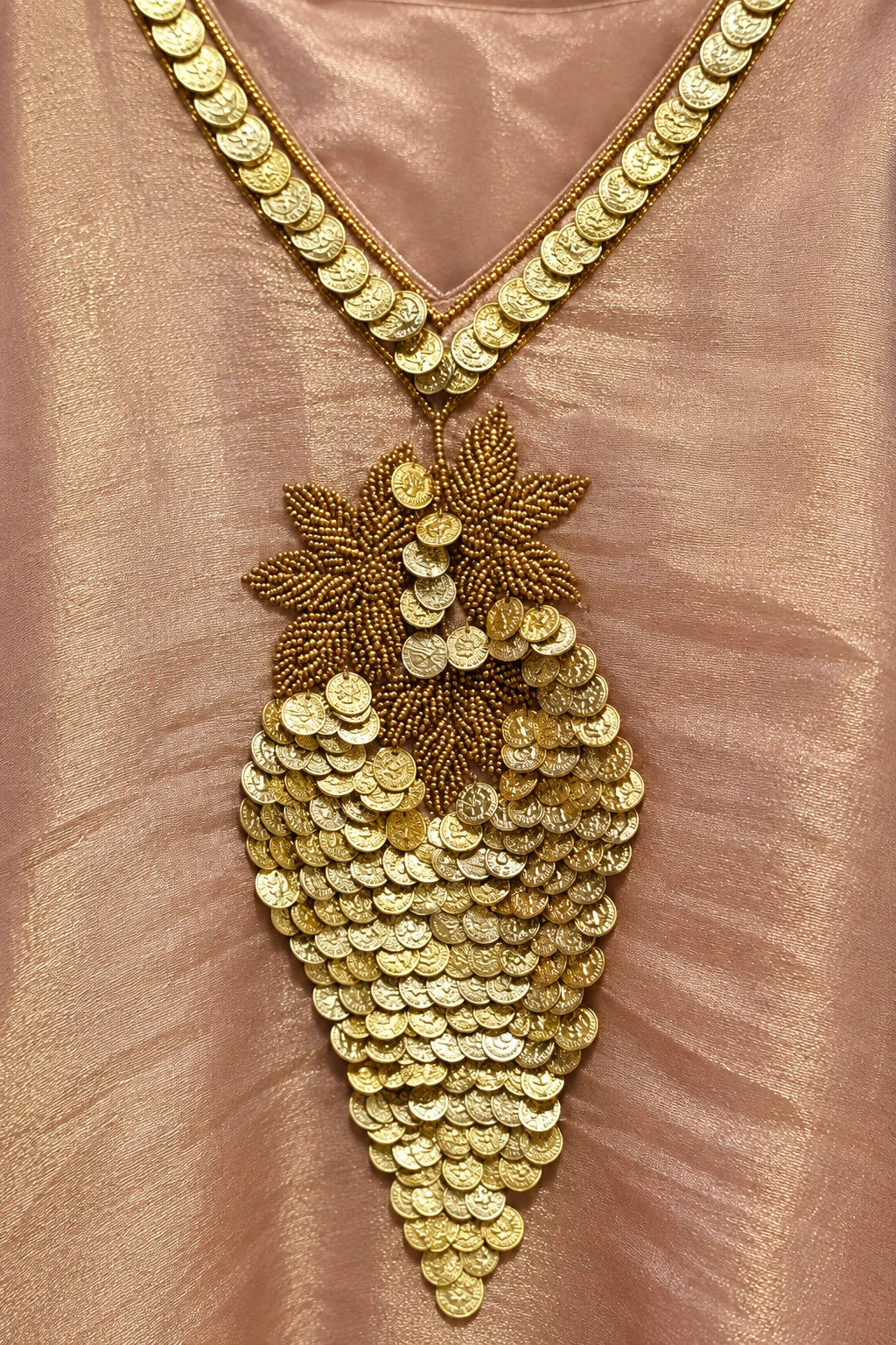 Champagne gold coin embroidery co-ord, work detail macro